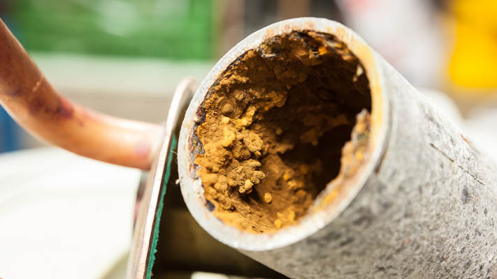 Sediment buildup caused by rust